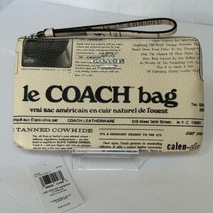 Coach cream & Black Large leather Newspaper print Wristlet NWT